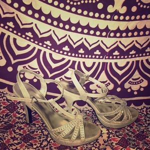 A big dazzled high heels.Has adjustable ankle size